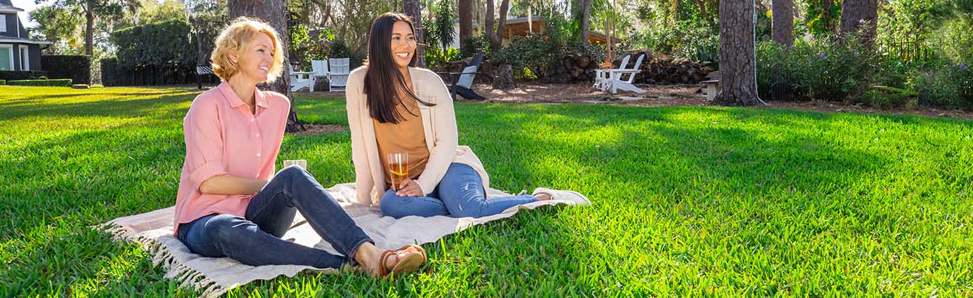 Friends enjoying a nice lawn