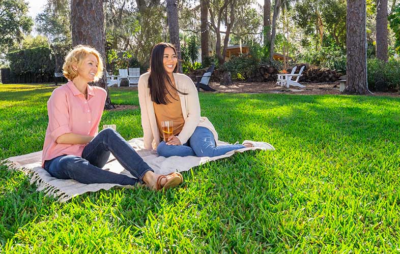 Friends enjoying a nice lawn